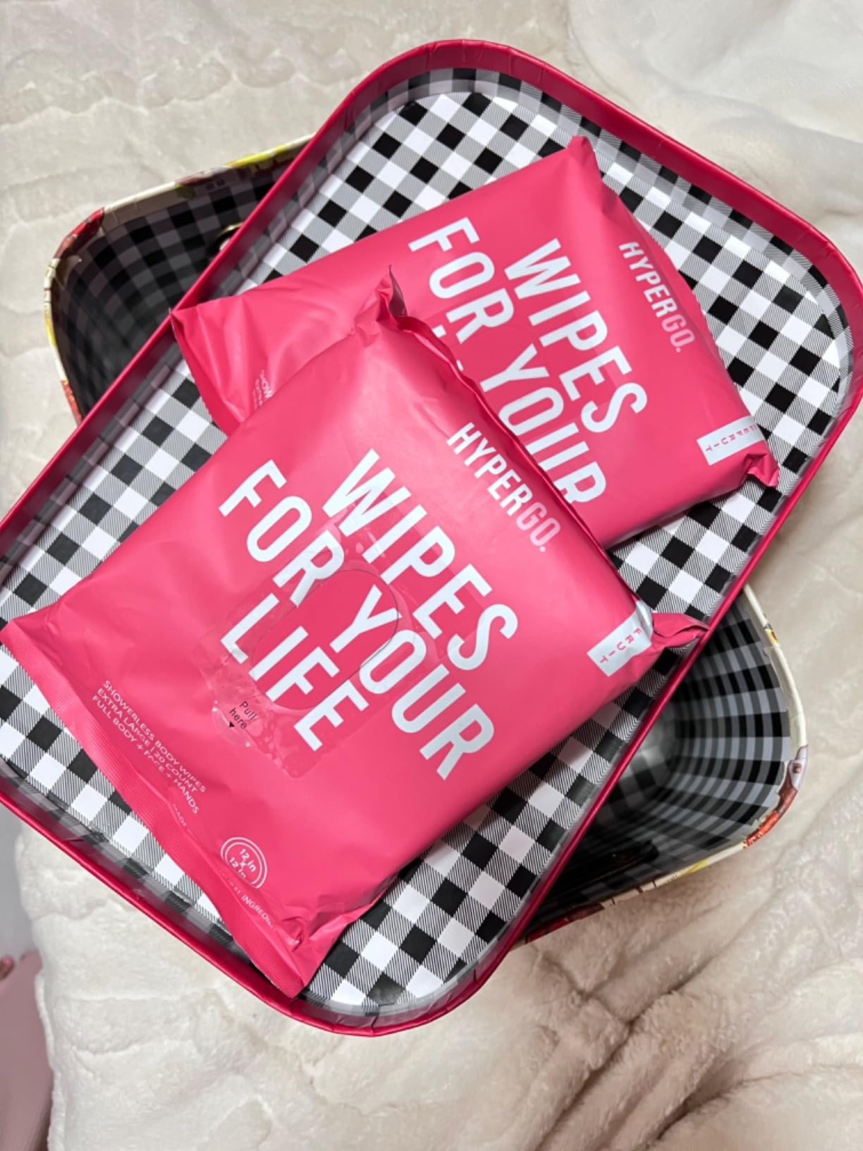 Two pink packages labeled 