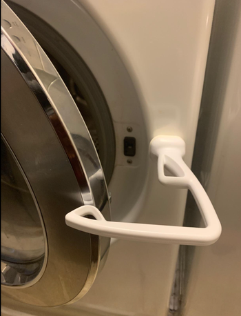 The stopper moved so the door can fully open 