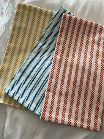 a trio of striped kitchen towels