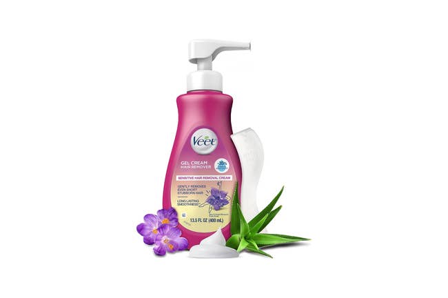 Veet hair removal gel cream bottle with pump, featuring lily and aloe vera elements, includes a spatula for application