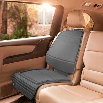 Car spot cushion placed connected a beige rider spot wrong a vehicle, enhancing comfortableness for agelong drives
