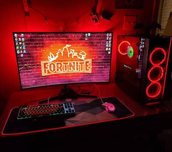 desk setup with red backlighting