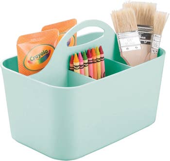 a product shot of the storage organizer holding craft supplies