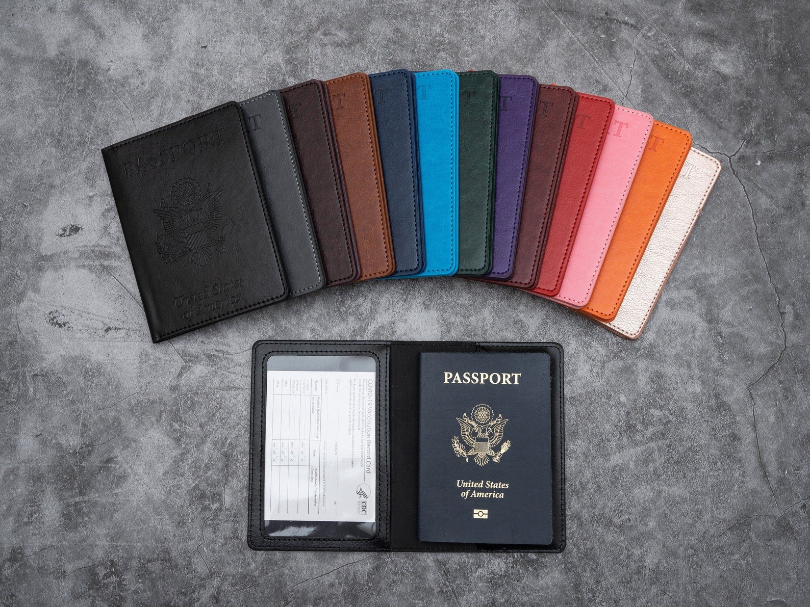 Passport holders in all different colors that open with a slot for your passport and vaccine card