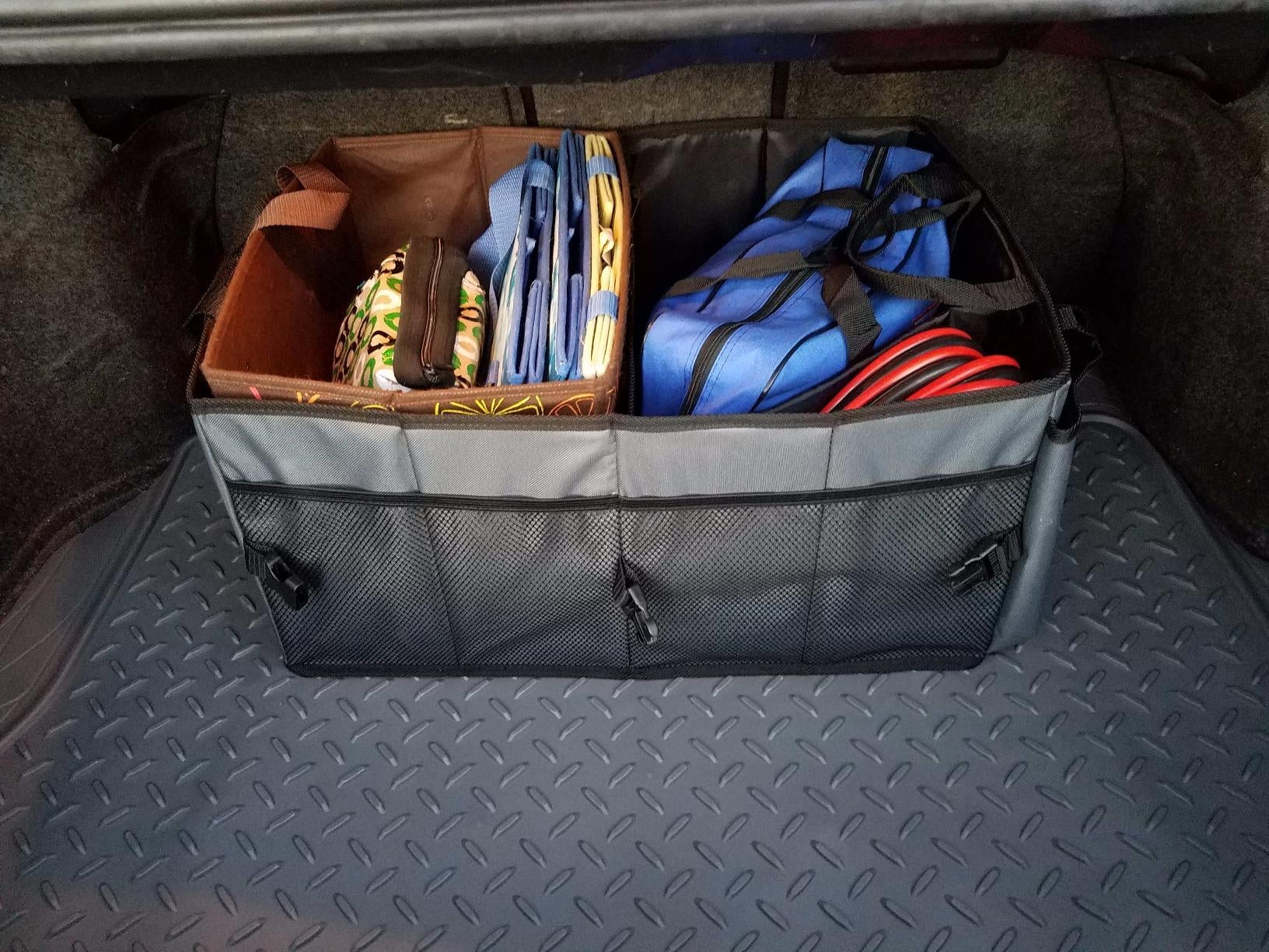 reviewer photo of the trunk organizer in their car