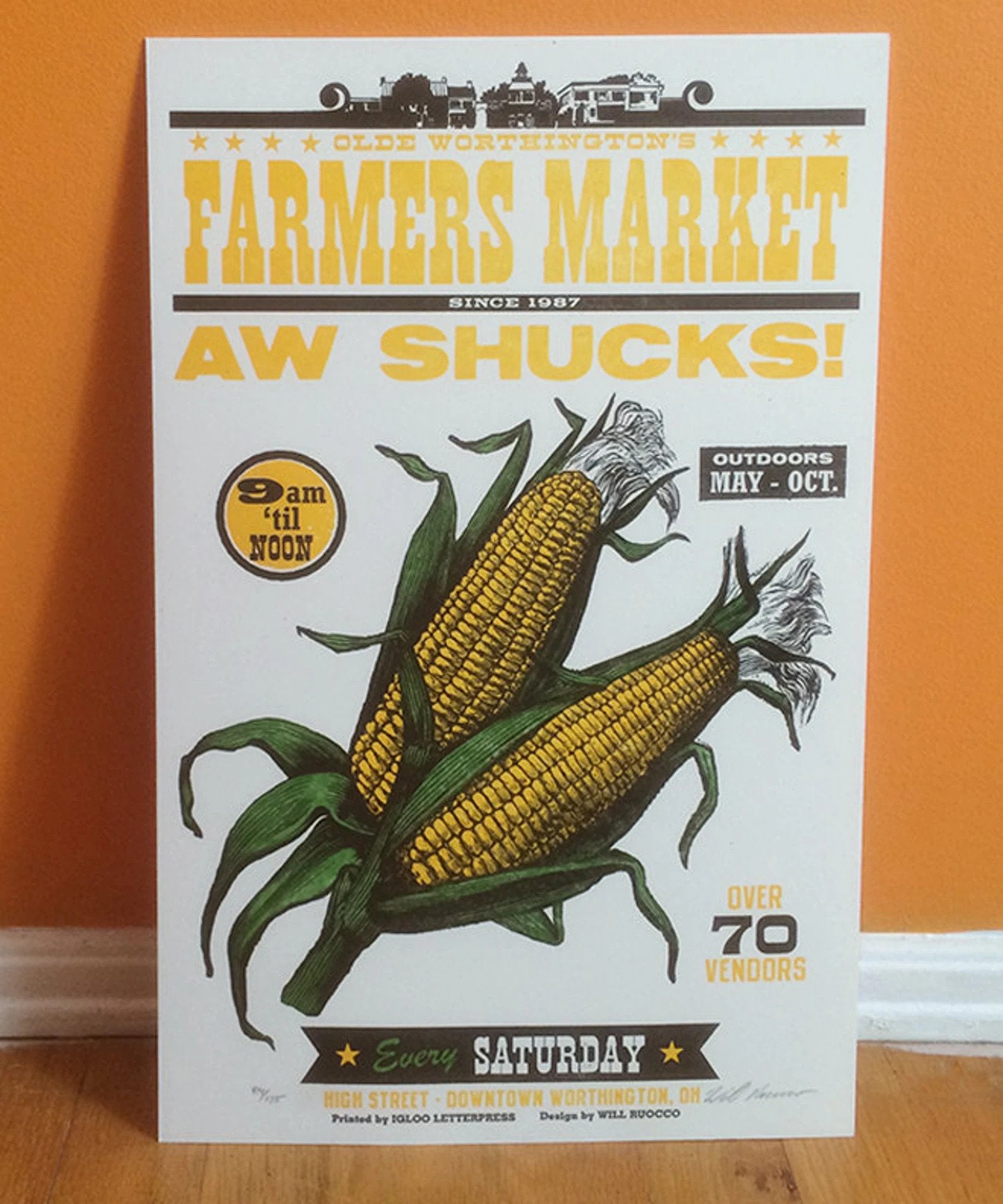 farmers market poster with two ears of corn on front