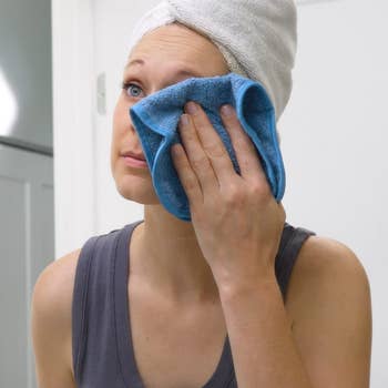 model washing face with reusable cloth