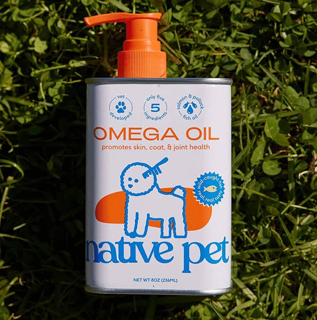the bottle of Native Pet omega oil outside on the grass