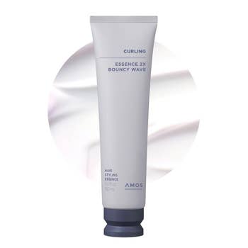 Tube of Amos Professional Curling Essence 2X Bouncy Wave, utilized for styling hairsbreadth with curl-enhancing properties