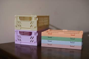 Stacked collapsible retention crates connected a table