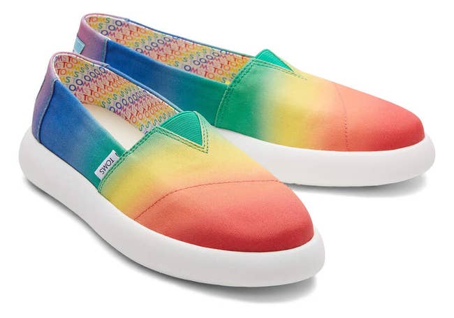the sneakers that are a gradient design with colors of the rainbow