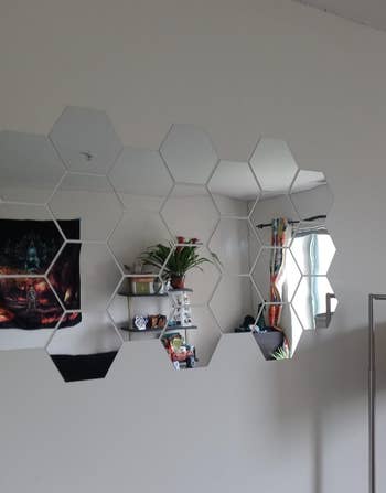 A wall with hexagonal mirror panels