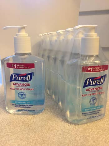 A reviewer's bottles of sanitizer on a counter