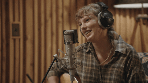 a gif of taylor swift in folklore long pond studio sessions on disney+