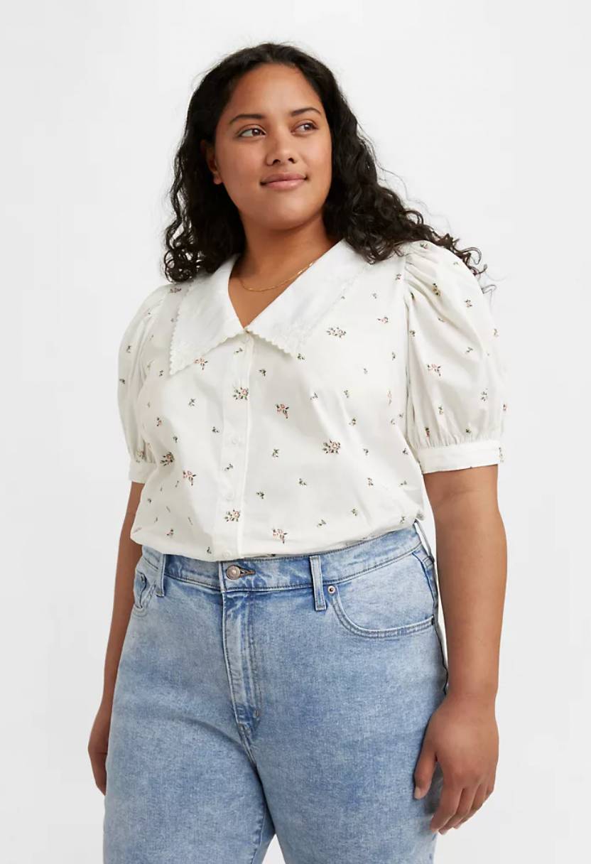 model wearing the white puff sleeve blouse with collars