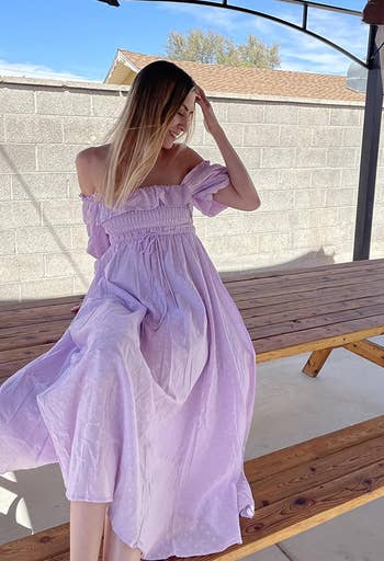 a reviewer in the lavender maxi dress