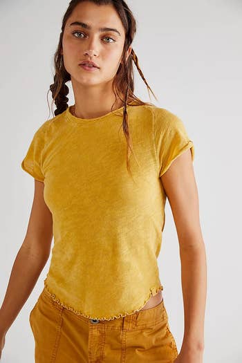 model wearing the yellow tee