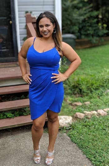 different reviewer wearing dress in blue