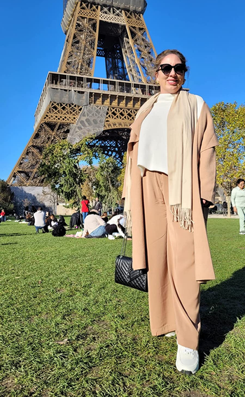 another reviewer wearing the tan-colored pants on vacation