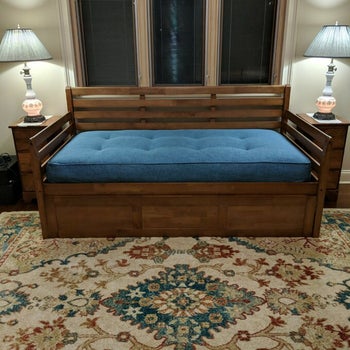 reviewer photo of wooden daybed