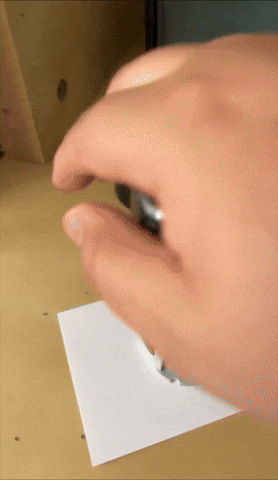 Hand utilizing a rolling stamp to screen  substance   connected  a expanse  of insubstantial  with privateness  patterns