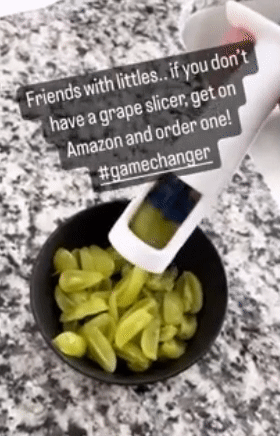 gif of reviewer using the grape cutter to slice grapes into quarters with a positive review quote over top
