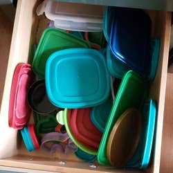 a reviewer's drawer with a chaotic mess of lids