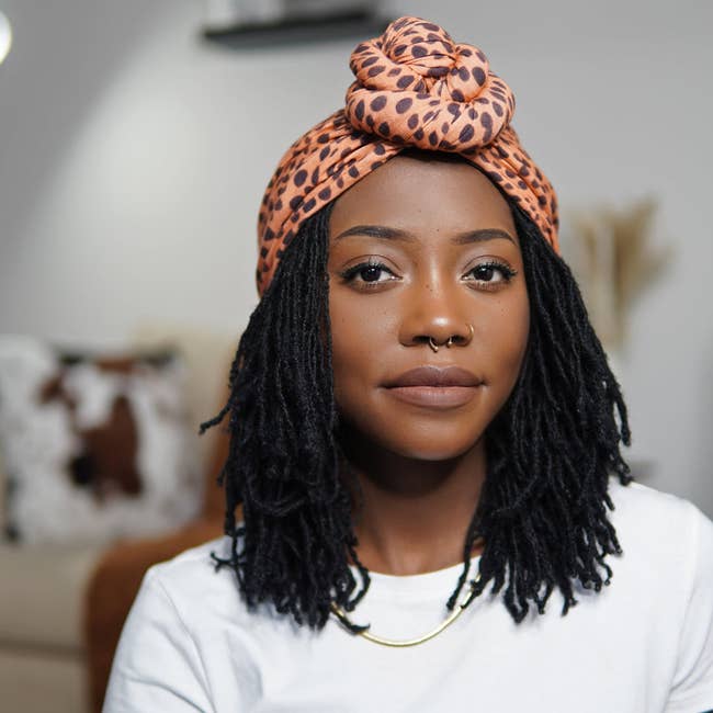 model wearing leopard print t-shirt bun headwrap