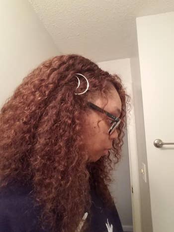 reviewer with moon clip in hair