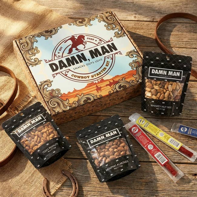 Snack kits with a chaotic  westbound  theme, including nuts and nutrient   sticks, are displayed connected  a rustic table. Packaging reads 