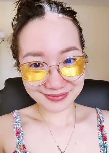 reviewer wearing the golden  oculus  gels