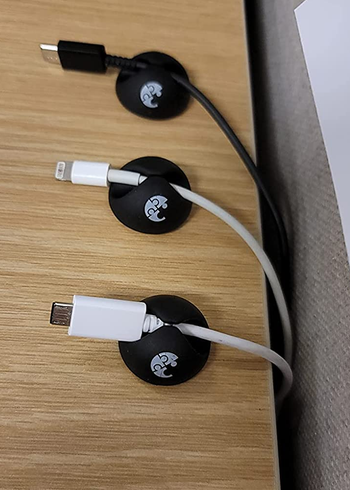 Reviewer's cable clips on a desk surface