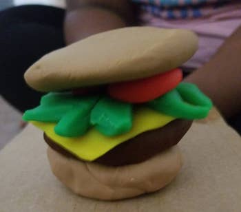 reviewer image of play-doh shaped into a burger