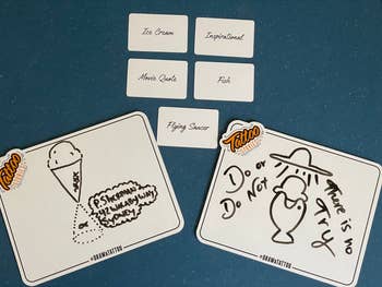 five selected cards and two boards with drawings of said cards