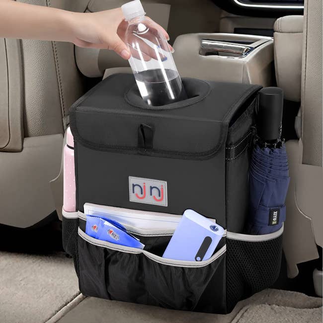 cube-shape car trash can with storage pockets on the front and sides