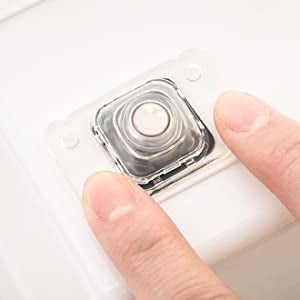 A model holding down the wheel to get it to stick to the bottom