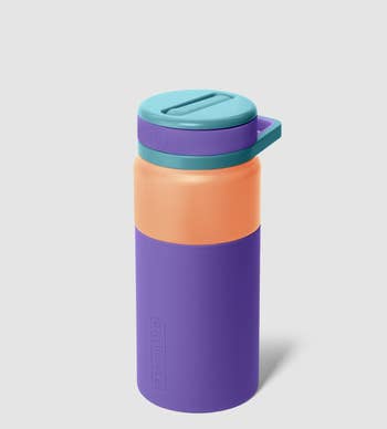 A yellow and purple twist-to-sip Brümate water bottle