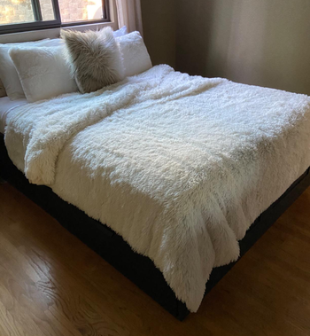 the white duvet cover on a reviewer's bed