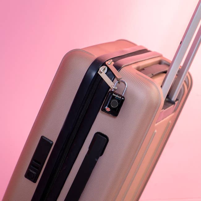 Pink luggage with BenjiLock on it