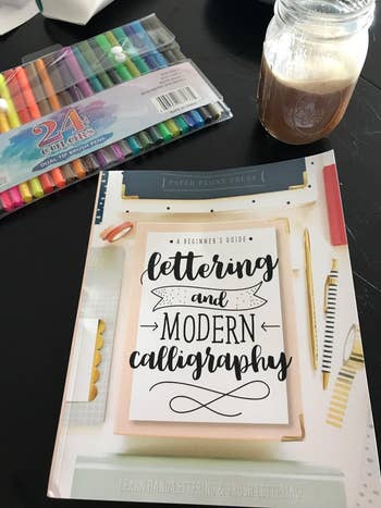 a reviewer's closed calligraphy book
