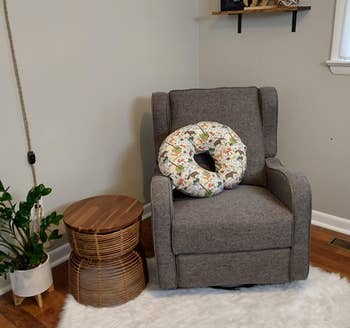 Reviewer image of white rug under gray chair