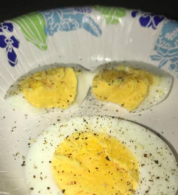 reviewer photo of a plate of perfectly cooked sliced hard-boiled eggs
