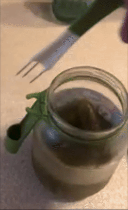 Jar opener instrumentality   demonstrated opening   a jar lid easily