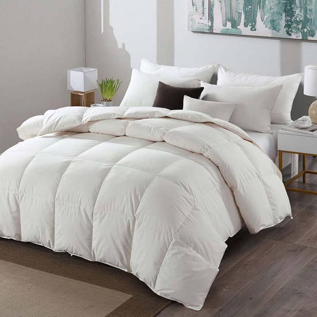 Luxury bedding acceptable featuring a plush, quilted duvet connected a neatly arranged furniture successful a modern, stylish chamber setting