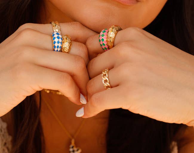 model wearing the different colored checkered rings