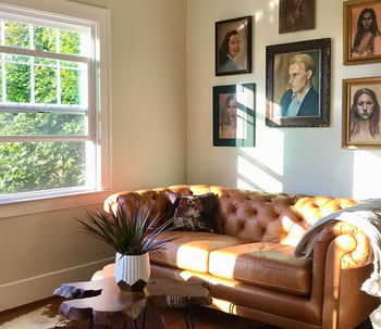 reviewer's brown leather couch