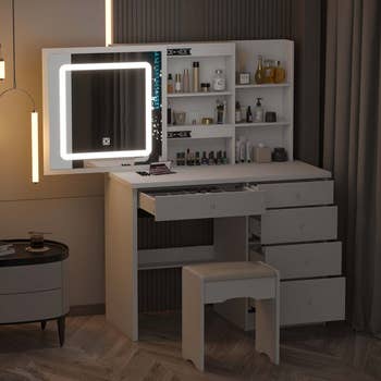 lifestyle photo of white vanity and drawers and slide-out mirror