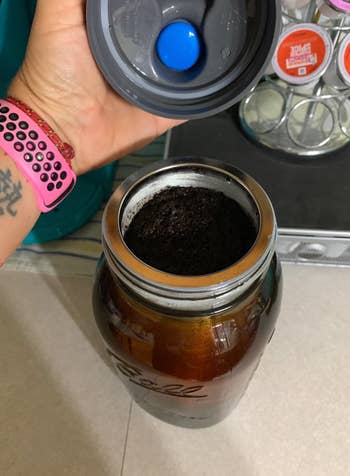 Reviewer photo of the cold brew maker with coffee grounds in the filter