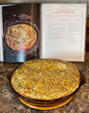 reviewer's homemade quiche successful  beforehand   of the unfastened  cookbook displaying a quiche look    