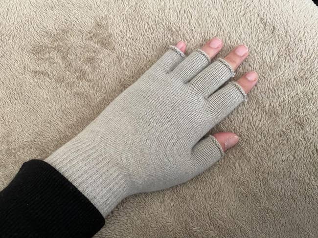 reviewer wearing the gloves in beige